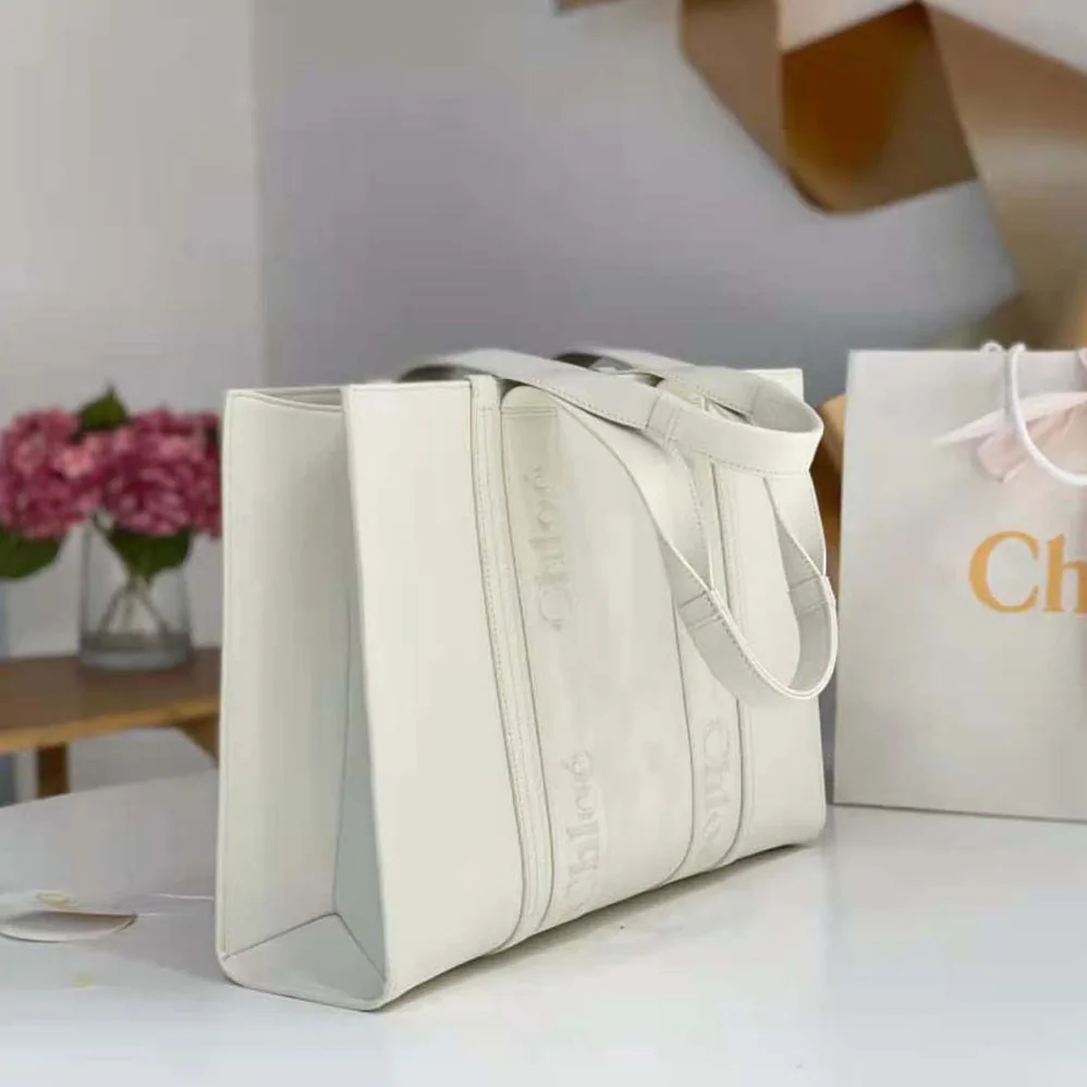 Chloe Large Woody Tote Bag with Embroidered Chloé Logo for Women in White Chloe Large Woody Tote Bag with Embroidered Chloé Logo for Women in White