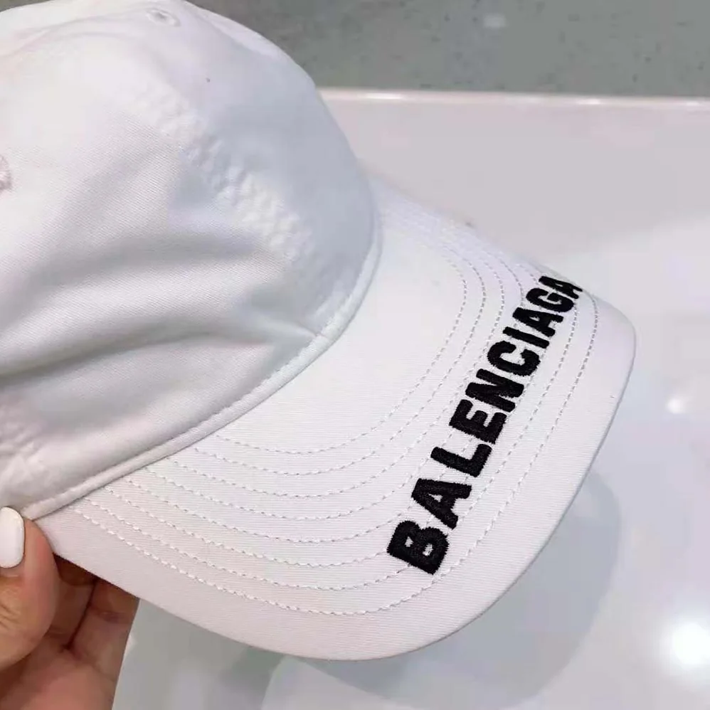 Balenciaga Logo Visor Cap in White and Black Cotton Drill for Women Balenciaga Logo Visor Cap in White and Black Cotton Drill for Women