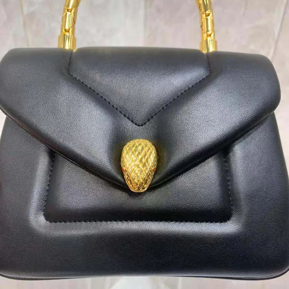 Bvlgari Serpenti Reverse Top Handle for Women in Black Bvlgari Serpenti Reverse Top Handle for Women in Black