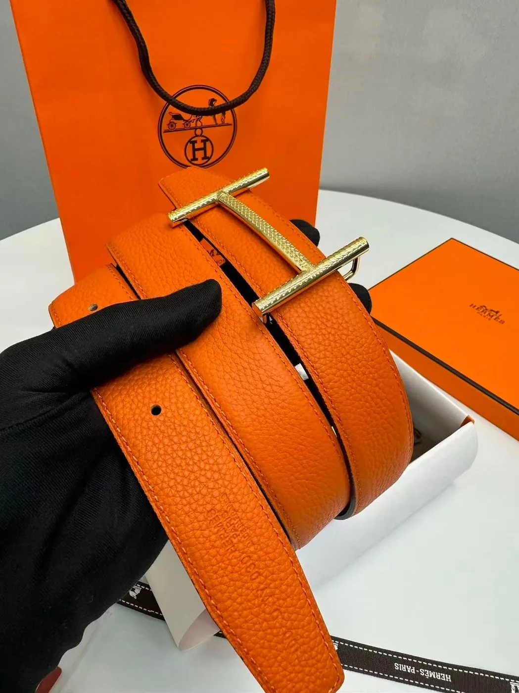 Hermès Hisseo Belt Buckle And Reversible Leather Strap Noir in Orange