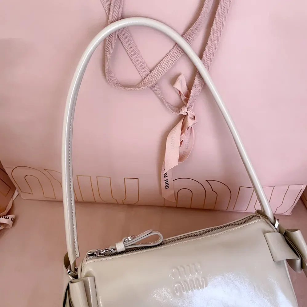 Miu Miu Shiny Leather Pouch for Women in Pink Miu Miu Shiny Leather Pouch for Women in Pink