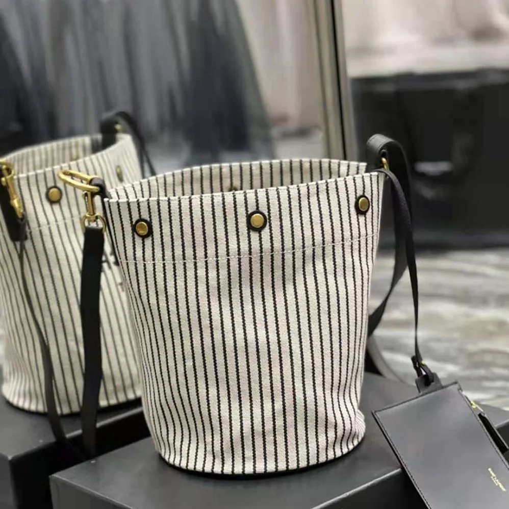 Saint Laurent YSL Rive Gauche Bucket Bag in Striped Canvas and Leather for Women Saint Laurent YSL Rive Gauche Bucket Bag in Striped Canvas and Leather for Women