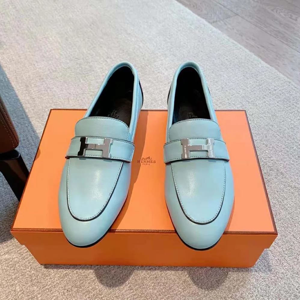 Hermes Paris Loafer in Calfskin with Palladium Plated Signature “H” Detail for Women in Blue Hermes Paris Loafer in Calfskin with Palladium Plated Signature “H” Detail for Women in Blue