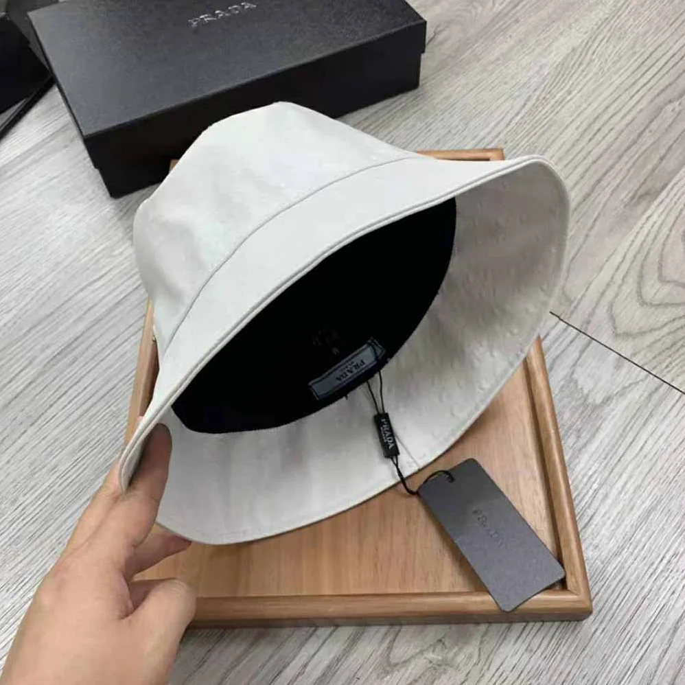 Prada Ostrich Leather Bucket Hat for Women in White Prada Ostrich Leather Bucket Hat for Women in White