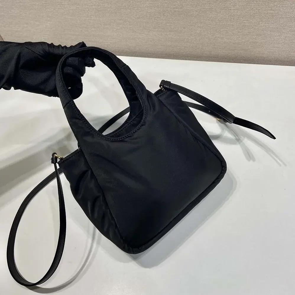 Prada Padded Re-Nylon Mini for Women in bag with Bow