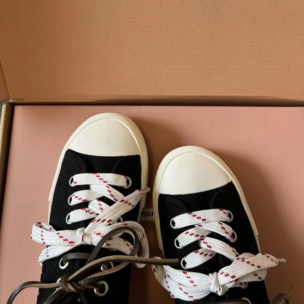 Miu Miu Washed Denim Sneakers for Women in Black Miu Miu Washed Denim Sneakers for Women in Black