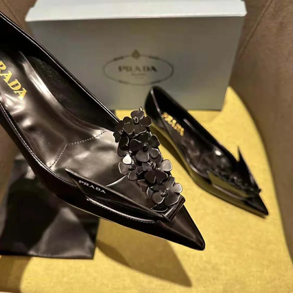 Prada Brushed Leather Pumps with Floral Appliqués for Women in Black