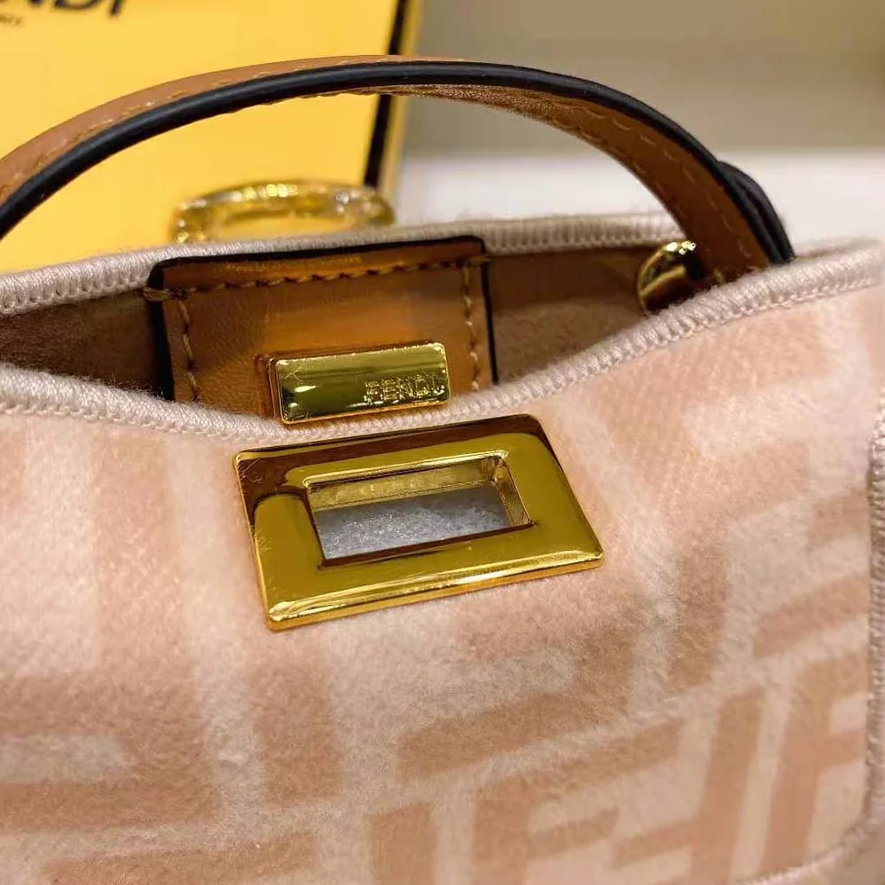 Fendi Nano Peekaboo Charm Beige Wool Charm for Women in Pink Fendi Nano Peekaboo Charm Beige Wool Charm for Women in Pink