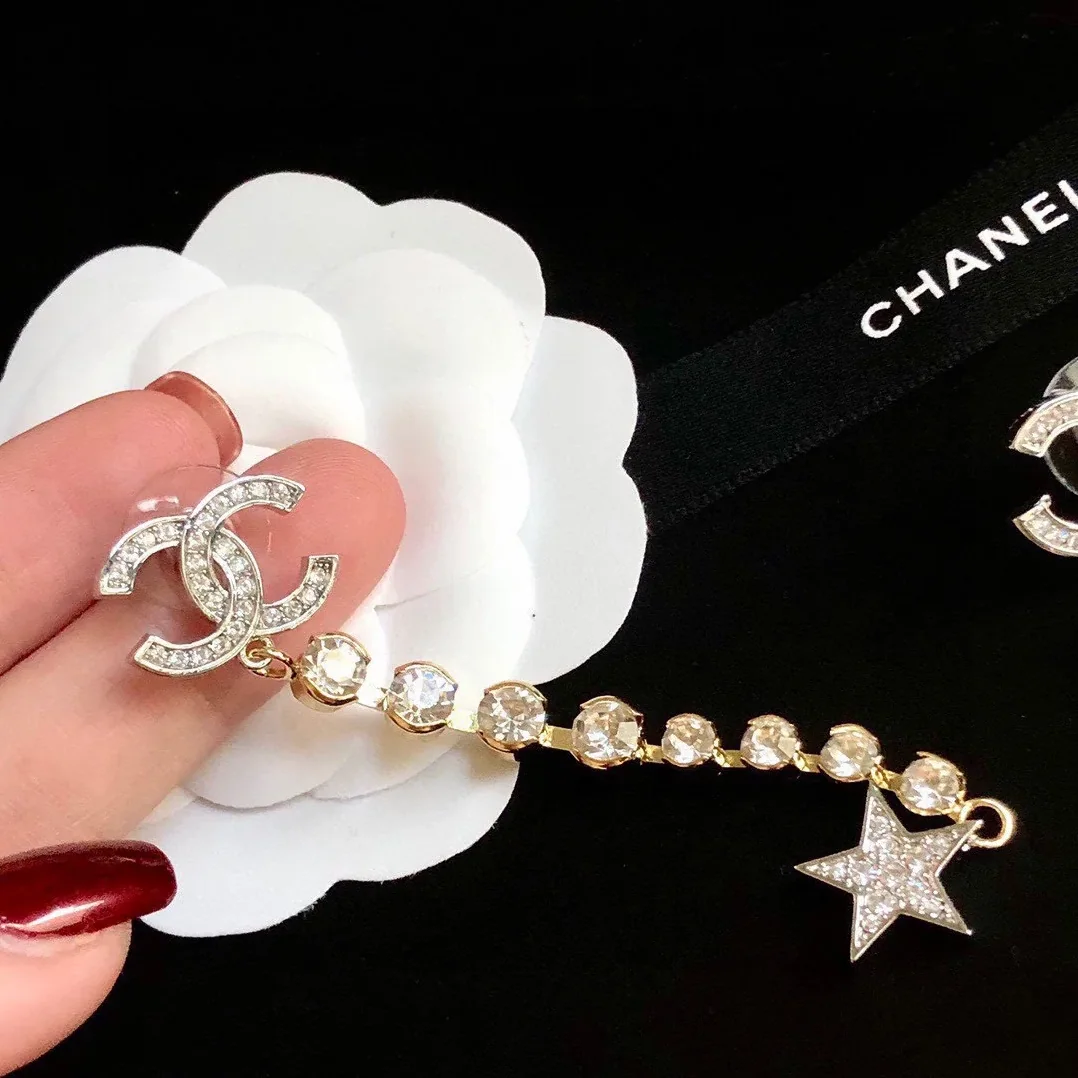 Chanel Long Star Earrings Gold Chanel Long Star Earrings Gold