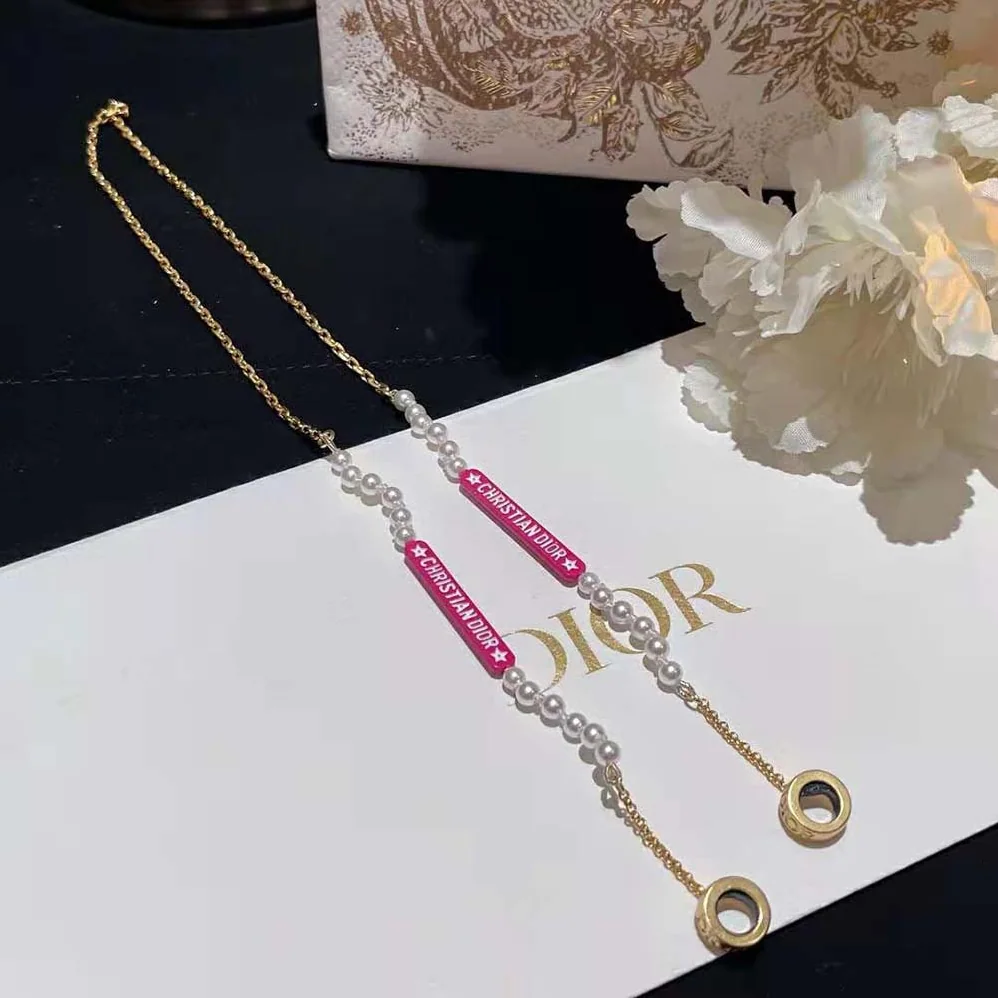 Dior D-Vibe Necklace for Headphones Gold-Finish Metal and White Resin Pearls for Women Dior D-Vibe Necklace for Headphones Gold-Finish Metal and White Resin Pearls for Women