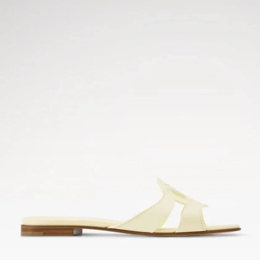 Louis Vuitton LV Isola Flat Mules Yellow 1AK1XP Louis Vuitton LV Isola Flat Mules Yellow 1AK1XP