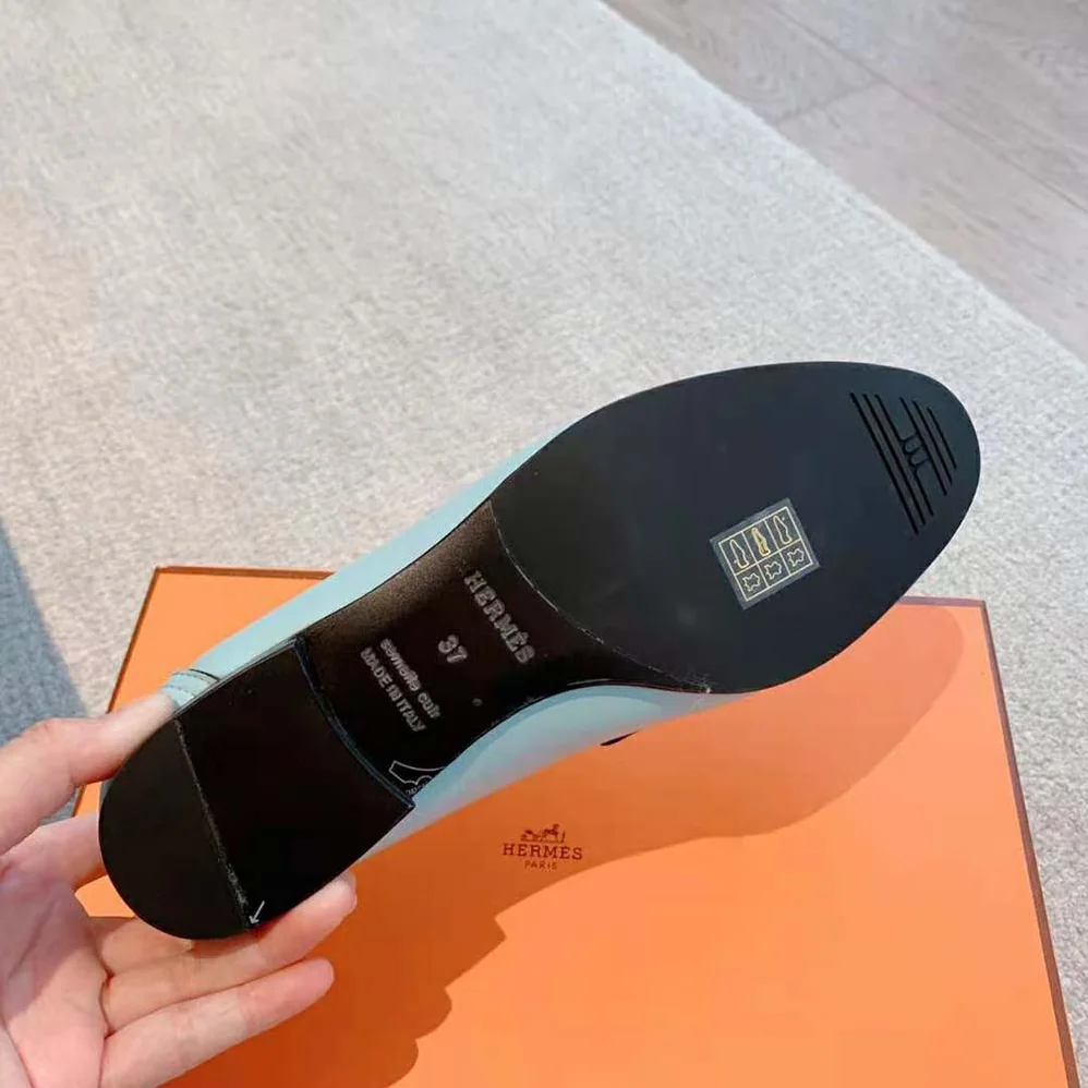 Hermes Paris Loafer in Calfskin with Palladium Plated Signature “H” Detail for Women in Blue Hermes Paris Loafer in Calfskin with Palladium Plated Signature “H” Detail for Women in Blue