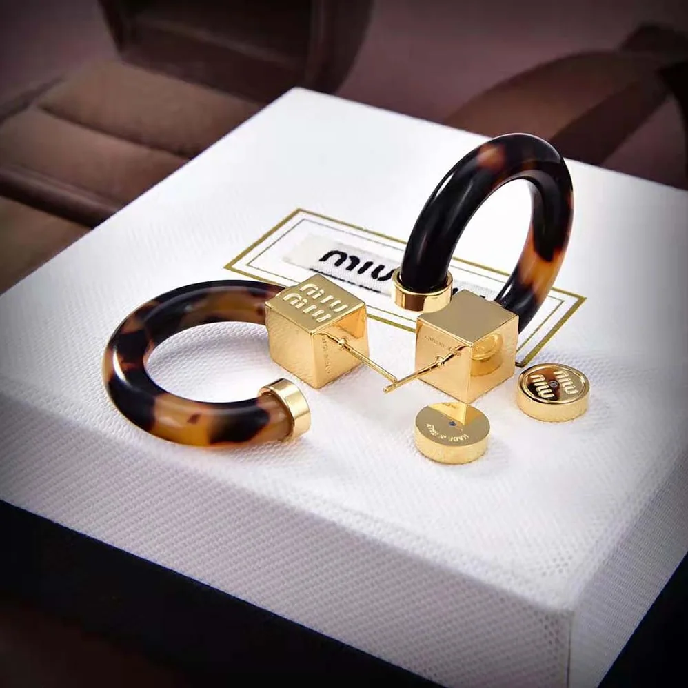 Miu Miu Plexiglas and Metal Earrings for Women Miu Miu Plexiglas and Metal Earrings for Women