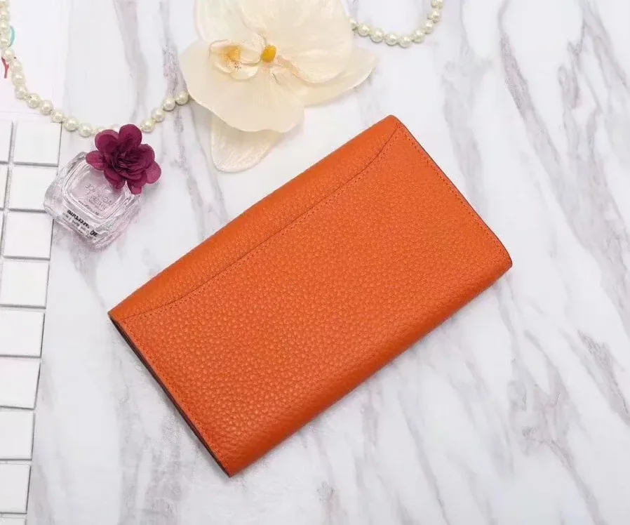Hermes Constance Togo Long Wallet in Silver Toned Hardware Orange Hermes Constance Togo Long Wallet in Silver Toned Hardware Orange