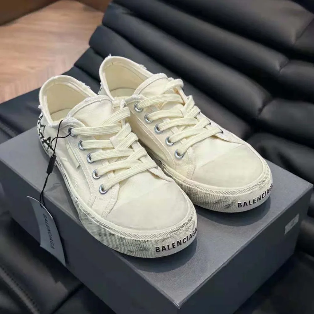 Balenciaga Paris Low Top Graffiti Sneaker in White for Unisex Balenciaga Paris Low Top Graffiti Sneaker in White for Unisex