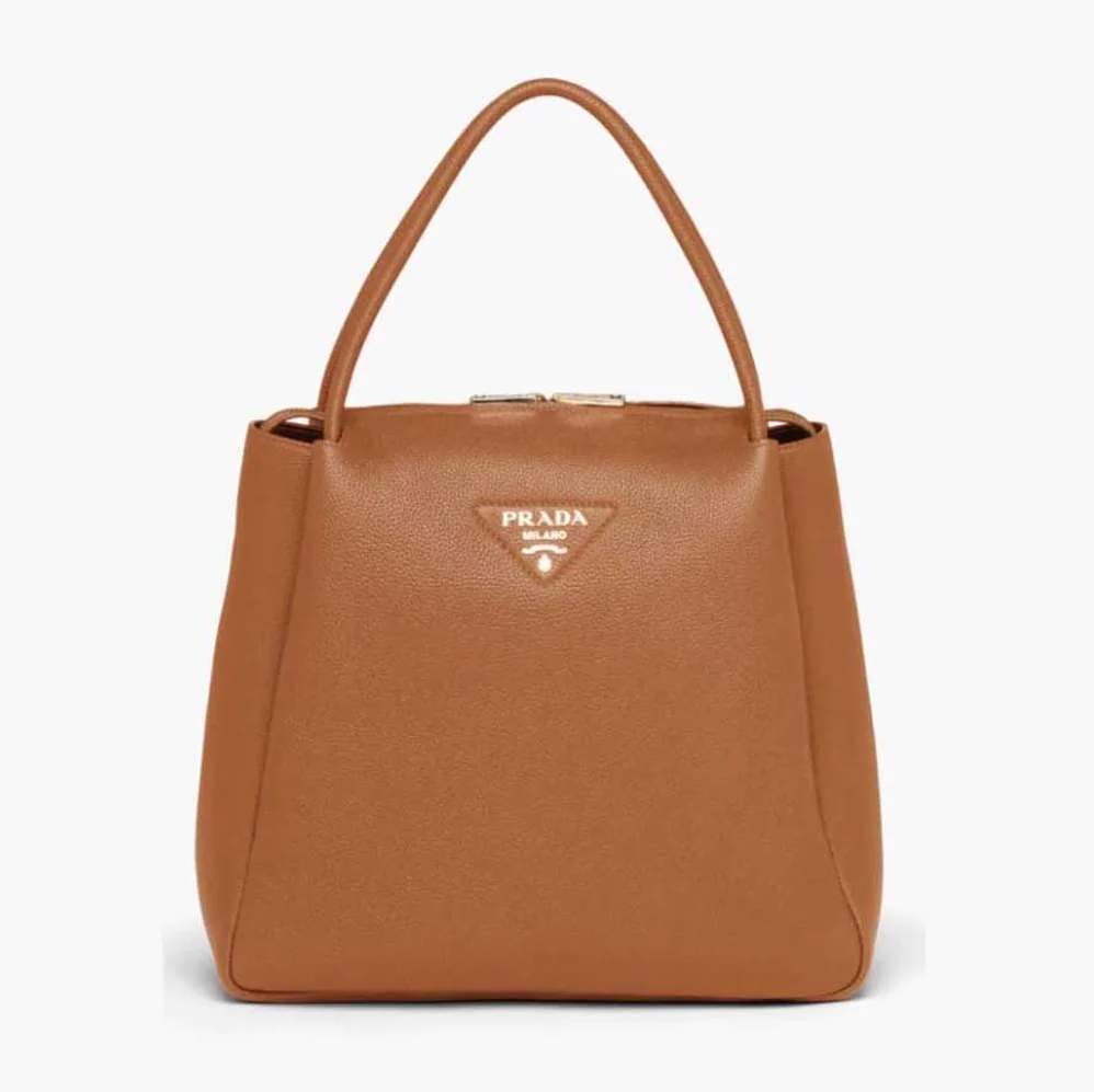 Prada Medium Leather handbag with the Prada Metal Lettering Logo Illuminating Its Center for Women