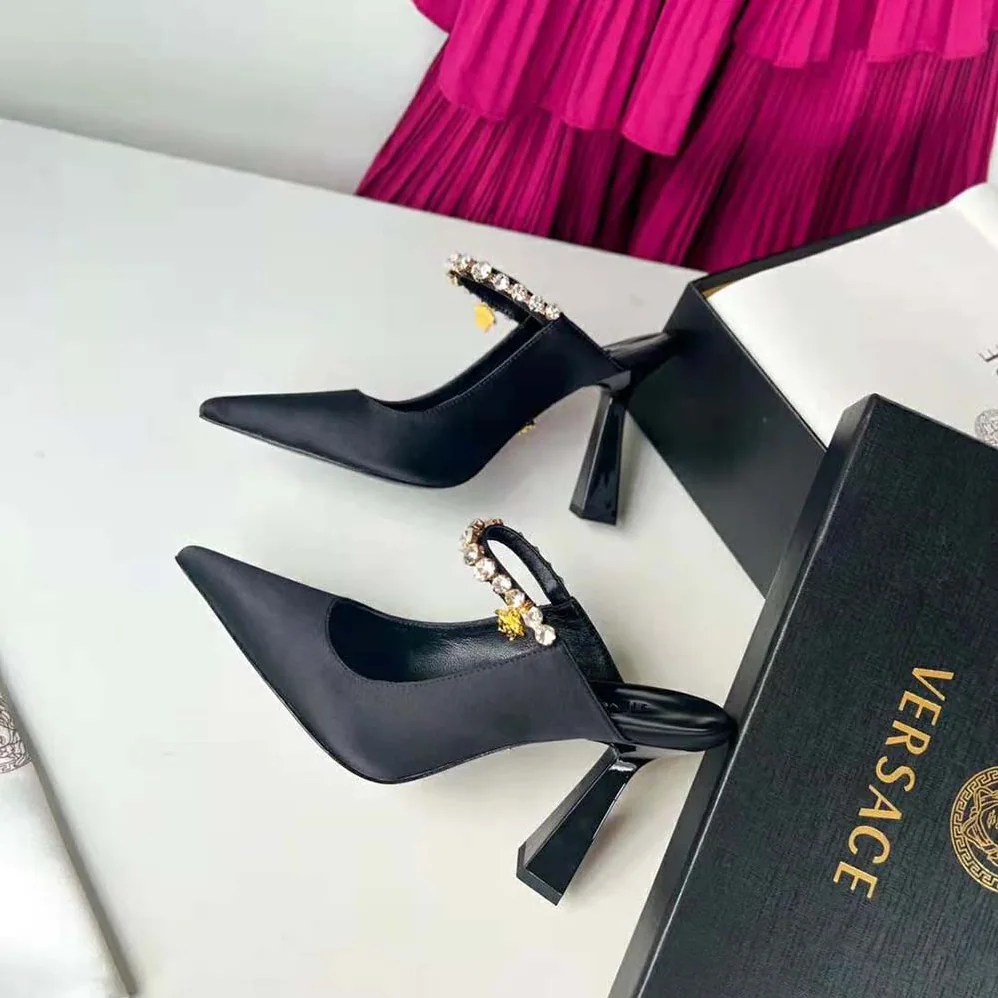 Versace Artifact Mules in 105mm Heel Height for Women in Black Versace Artifact Mules in 105mm Heel Height for Women in Black