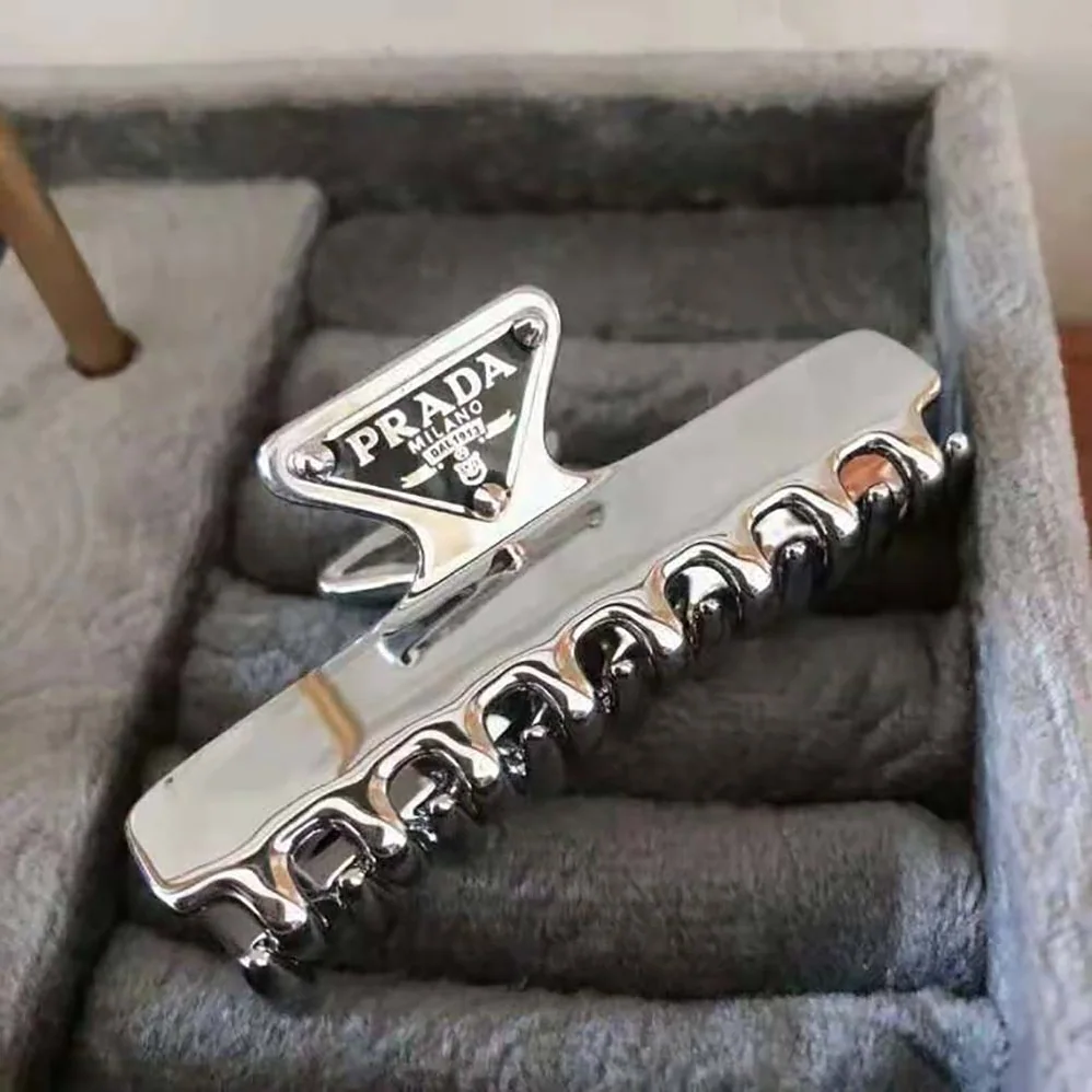 Prada Metal Hair Clip with Sophisticated and Versatile Allure for Women Prada Metal Hair Clip with Sophisticated and Versatile Allure for Women