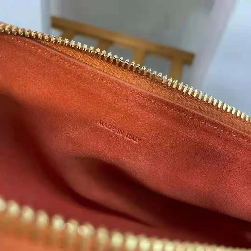 Celine Medium Romy in Supple Calfskin for Women in Orange Celine Medium Romy in Supple Calfskin for Women in Orange