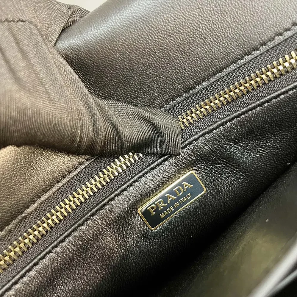Prada Soft Sound Large Leather Shoulder Bag with Charms for Women in Black