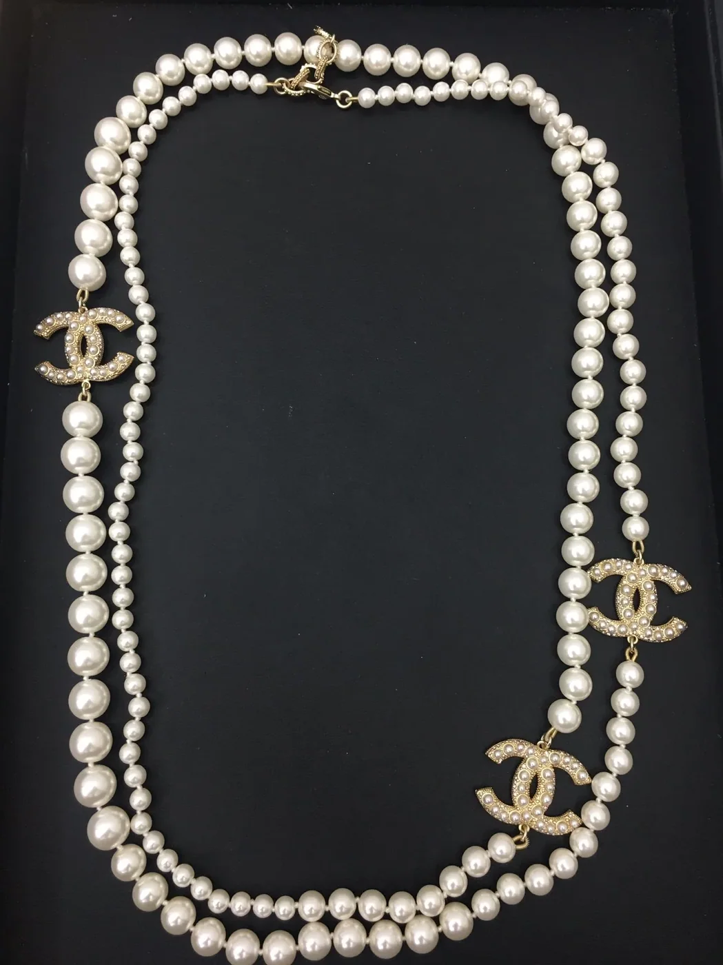 Chanel Three Chanel Iconics Pearl Necklace White Chanel Three Chanel Iconics Pearl Necklace White