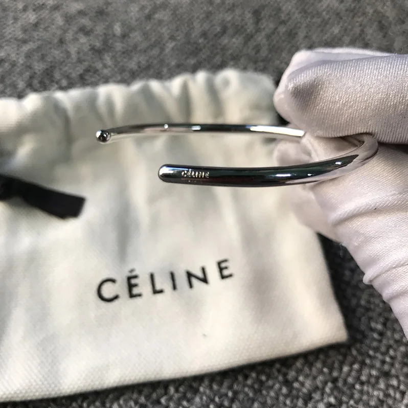 Celine Knot Extra-Thin Bracelet in Brass with Rhodium Finish for Women in Silver Celine Knot Extra-Thin Bracelet in Brass with Rhodium Finish for Women in Silver