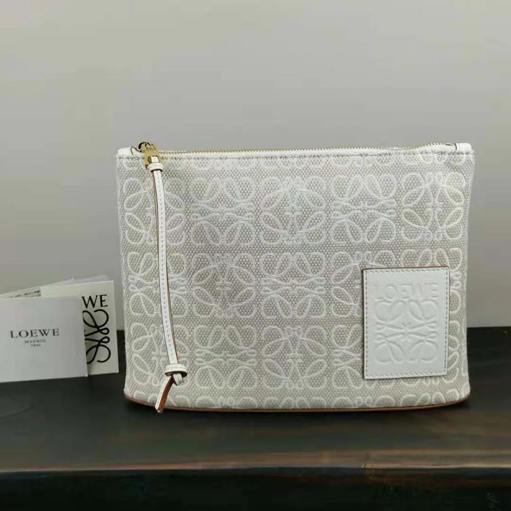 Loewe Oblong Anagram Pouch in Jacquard and Calfskin for Women in White Loewe Oblong Anagram Pouch in Jacquard and Calfskin for Women in White