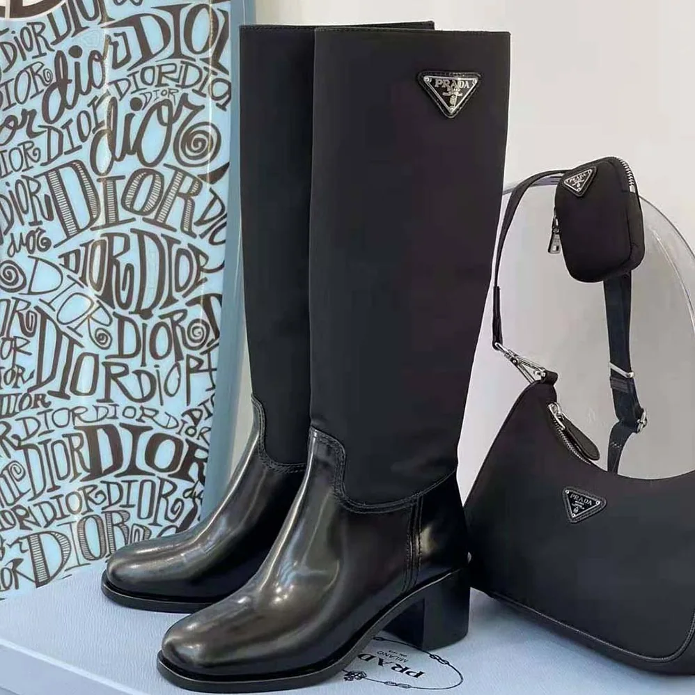 Prada Brushed Leather and Nylon Boots for Women in Black