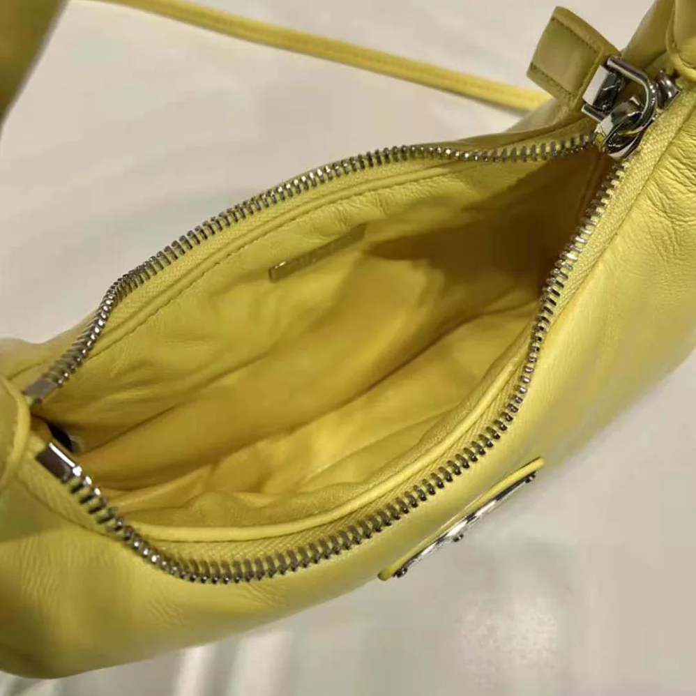 Prada Soft Padded Nappa Leather Mini-Bag for Women in Yellow Prada Soft Padded Nappa Leather Mini-Bag for Women in Yellow