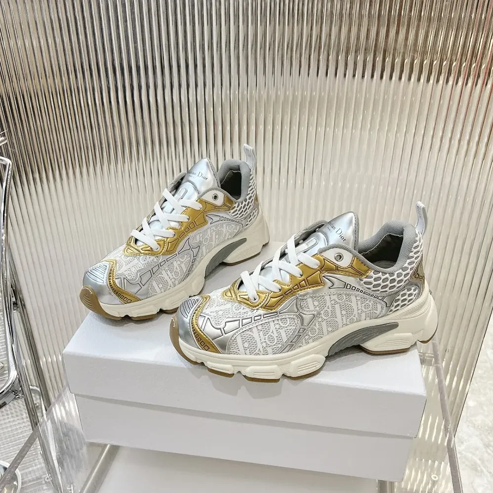 Dior Vibe Sneaker White Mesh Printed with Dior Oblique Motif and Gold- and Silver in Tone Dior Vibe Sneaker White Mesh Printed with Dior Oblique Motif and Gold- and Silver in Tone