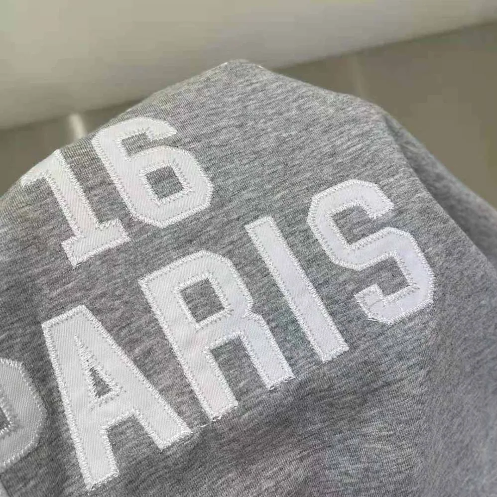 Celine Embroidered Celine 16 T-shirt in Cotton Jersey for Women in Silver Celine Embroidered Celine 16 T-shirt in Cotton Jersey for Women in Silver