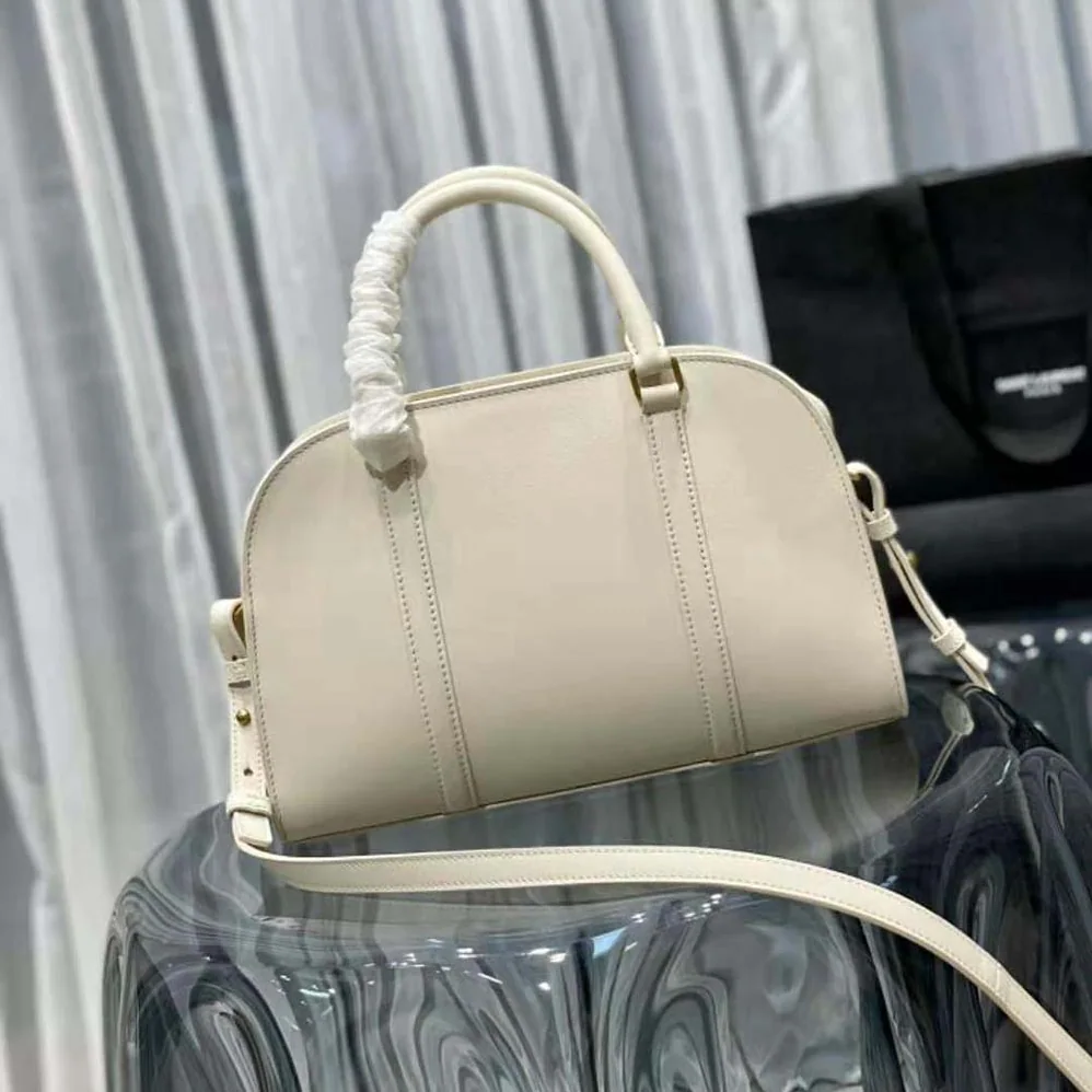 Saint Laurent YSL Lock Baby Duffle in Smooth Leather for Women in White Saint Laurent YSL Lock Baby Duffle in Smooth Leather for Women in White