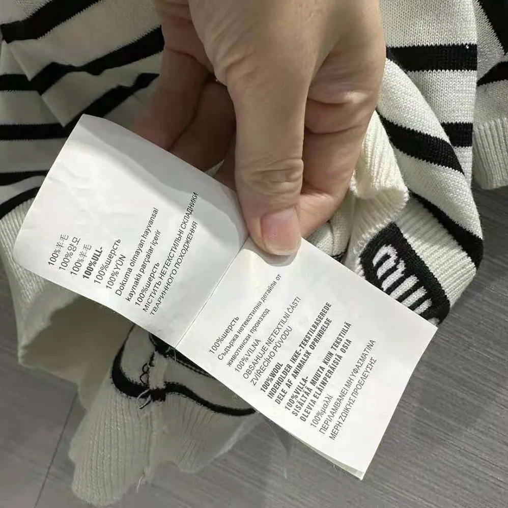 Miu Miu Cotton Crew-Neck Sweater with Intarsia Logo for Women in Black Miu Miu Cotton Crew-Neck Sweater with Intarsia Logo for Women in Black