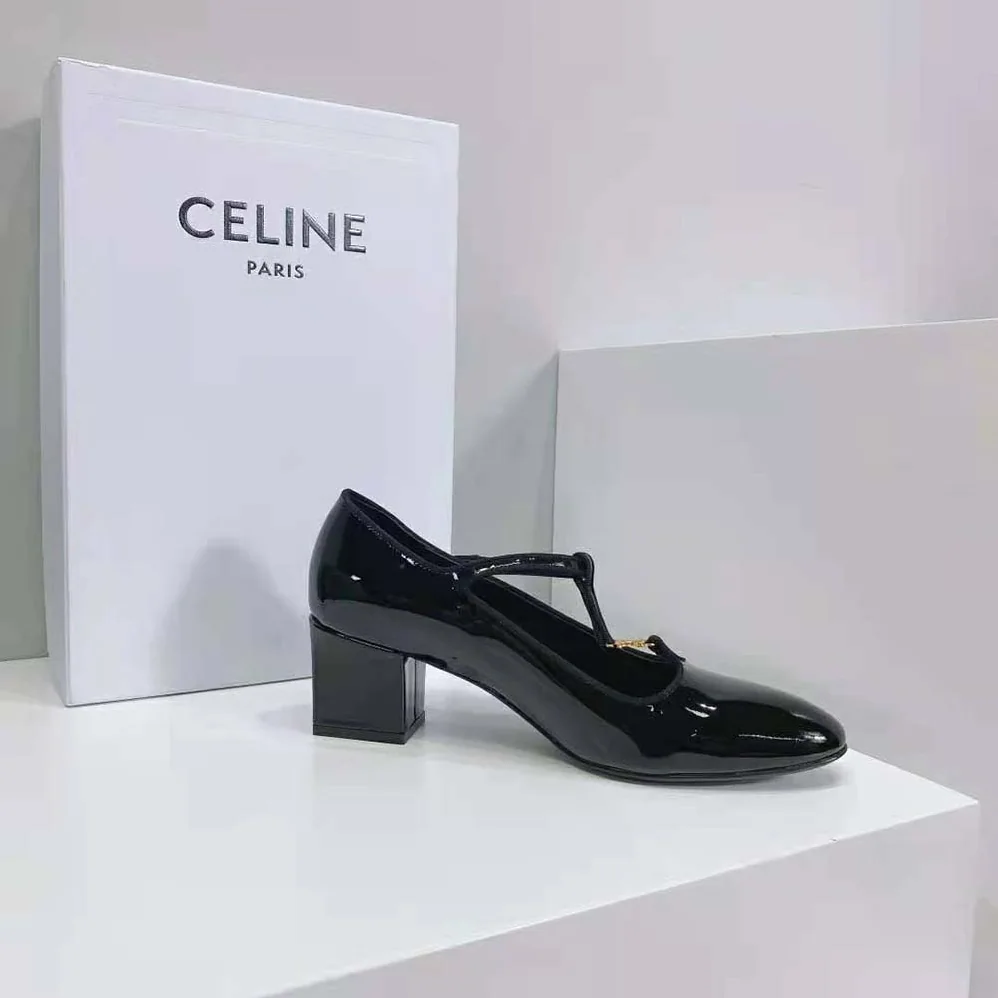 Celine Babies T-Bar Pump in Patent Calfskin and Grosgrain for Women in Black Celine Babies T-Bar Pump in Patent Calfskin and Grosgrain for Women in Black