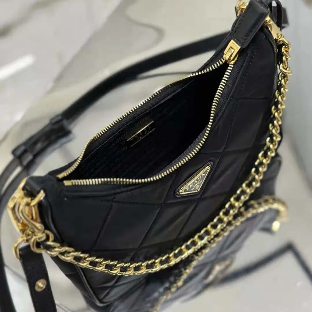 Prada Re-Edition 1995 Chaîne Re-Nylon Mini-bag for Women in Black Prada Re-Edition 1995 Chaîne Re-Nylon Mini-bag for Women in Black