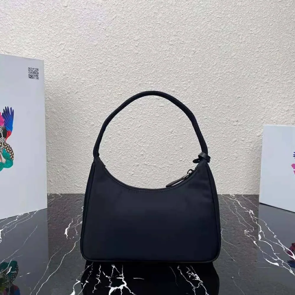 Prada Re-Nylon Re-Edition 2000 Mini-Bag for Women in Black Prada Re-Nylon Re-Edition 2000 Mini-Bag for Women in Black