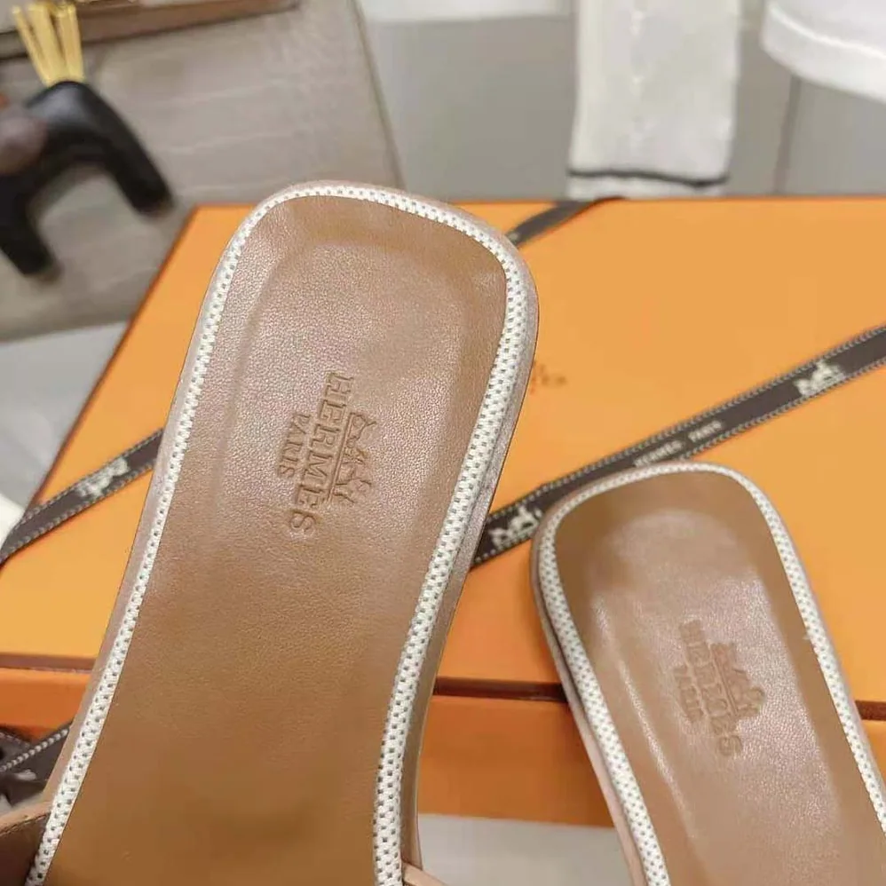 Hermes Oran Sandal in Calfskin and H Canvas with Iconic H Cut for Women in Out Hermes Oran Sandal in Calfskin and H Canvas with Iconic H Cut for Women in Out