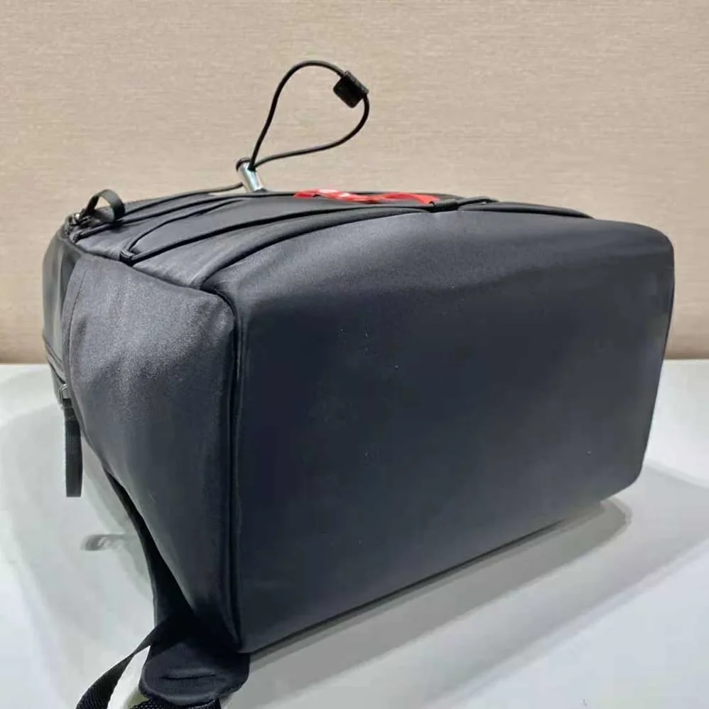 Prada Technical Fabric Backpack with a Functional and Versatile Design for Men in Black