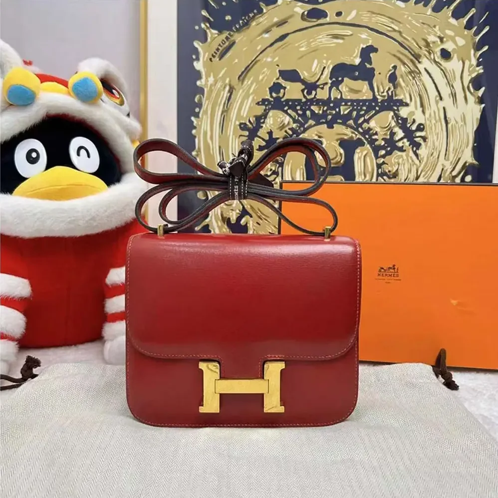 Hermes Constance 24 Bag Box Leather for Women in Red/Gold
