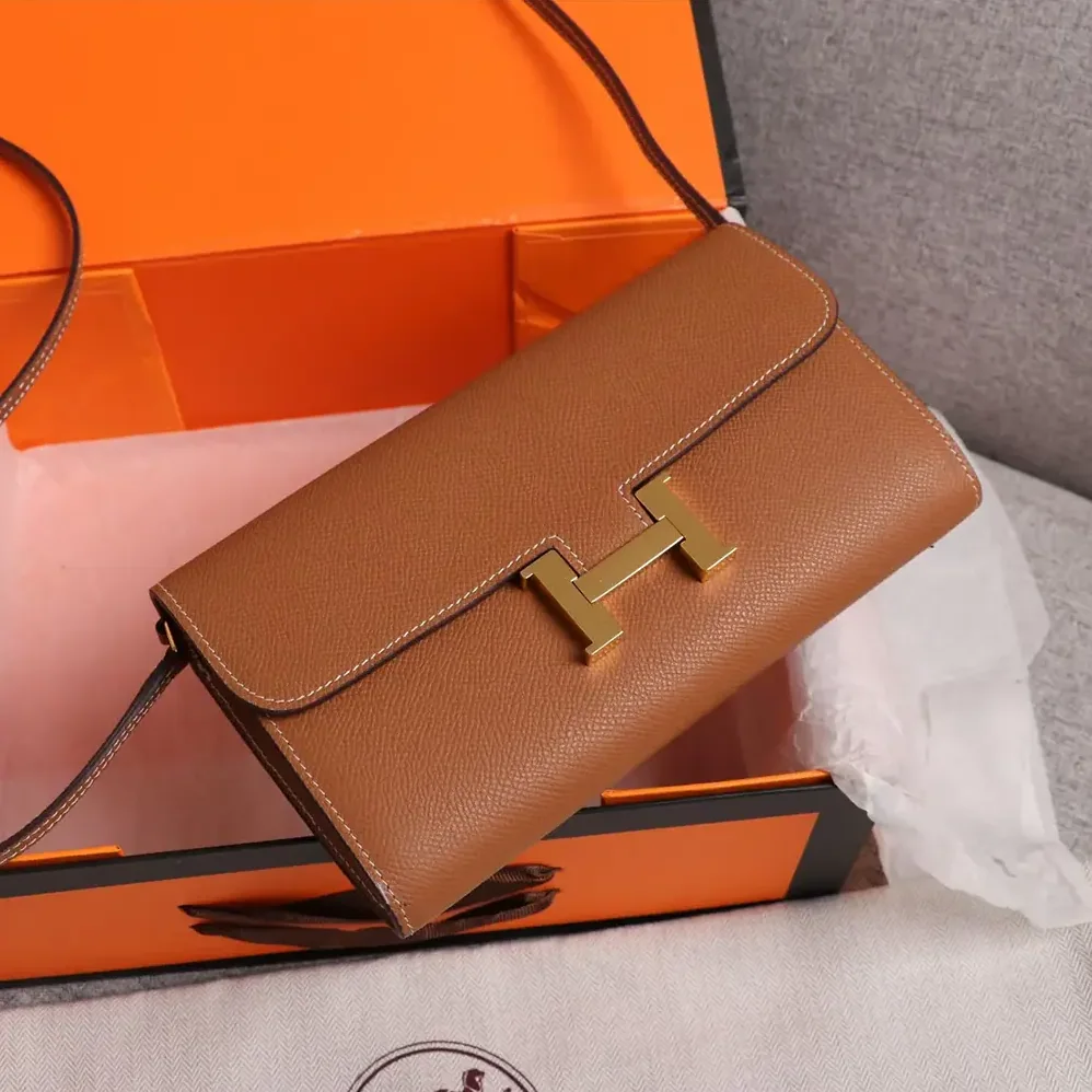 Hermes Constance Long To Go in Epsom Leather for Women in Brown/Gold