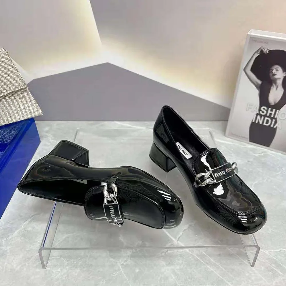 Miu Miu Patent Leather Loafers in 35 mm Heel Height for Women in Black
