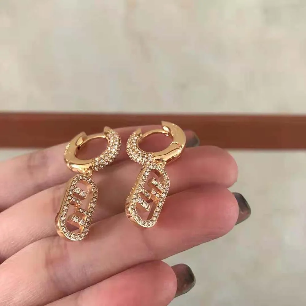 Fendi O Lock Earrings Gold-Colored Earrings in Bronze and Zircon for Women Fendi O Lock Earrings Gold-Colored Earrings in Bronze and Zircon for Women