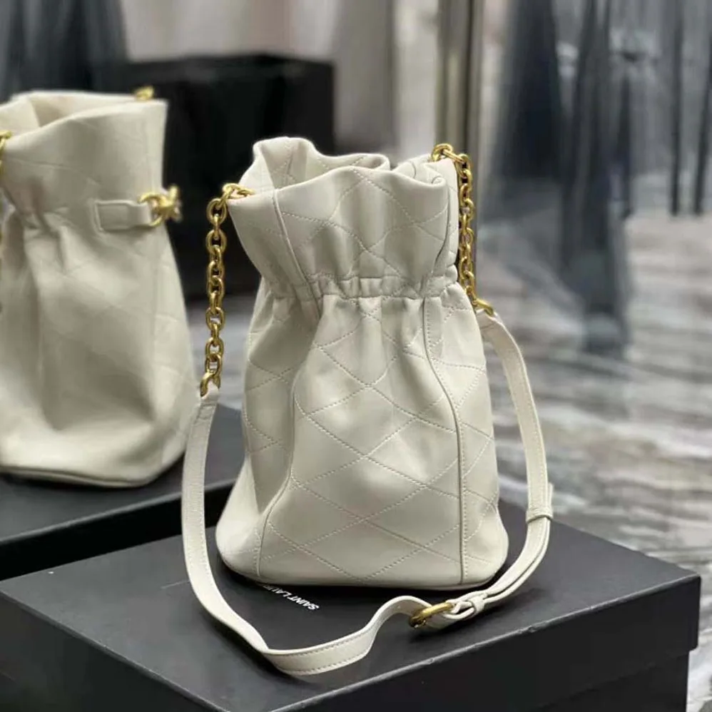 Saint Laurent YSL Le Maillon Hook Bucket Bag in Supple Leather for Women in White Saint Laurent YSL Le Maillon Hook Bucket Bag in Supple Leather for Women in White