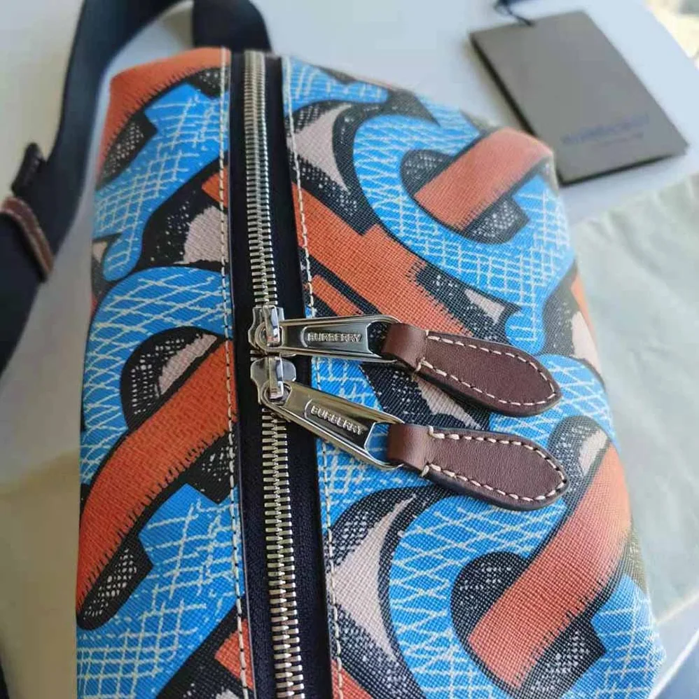 Burberry Monogram Print E-canvas Sonny Bum Bag for Women in Orange