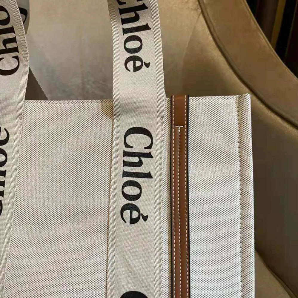 Chloe Medium Woody Tote Bag in Cotton Canvas and Shiny Calfskin with Woody Ribbo for Women in Brown Chloe Medium Woody Tote Bag in Cotton Canvas and Shiny Calfskin with Woody Ribbo for Women in Brown