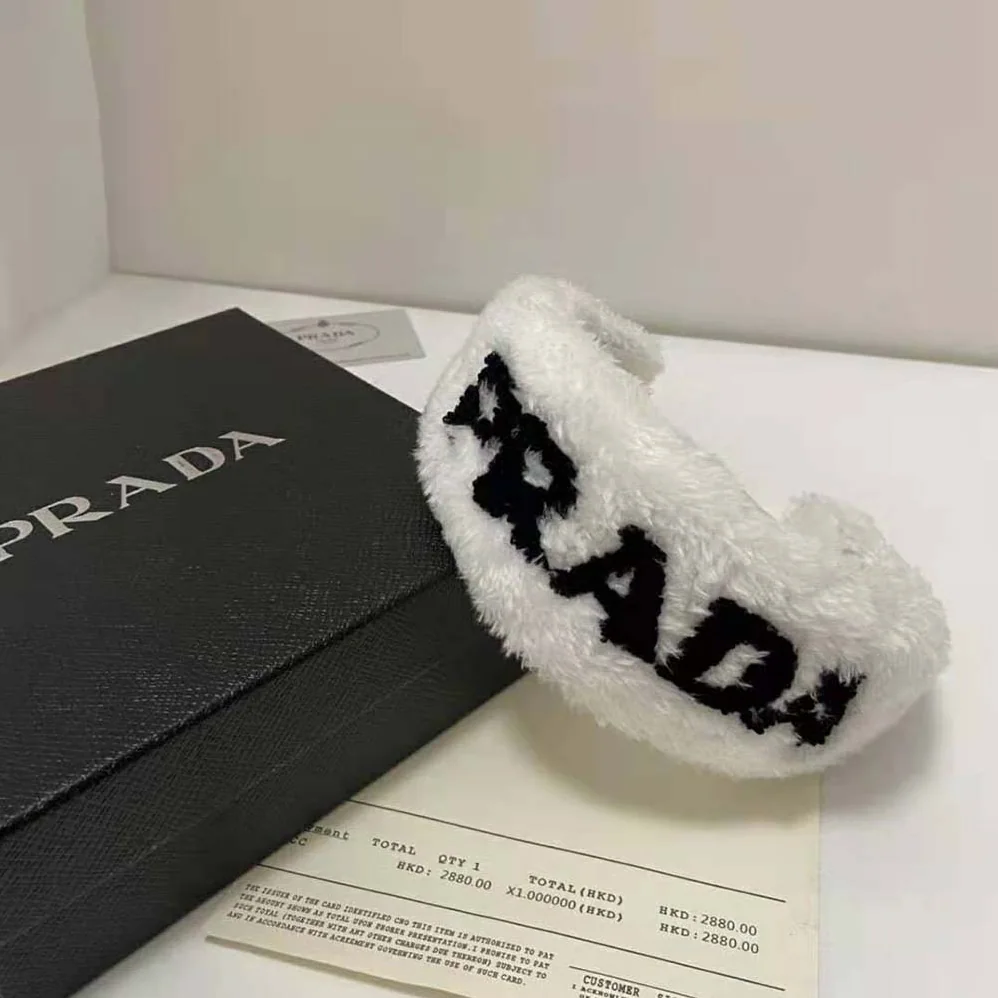Prada Terrycloth Headband with A Beguiling Rounded Design for Women Prada Terrycloth Headband with A Beguiling Rounded Design for Women