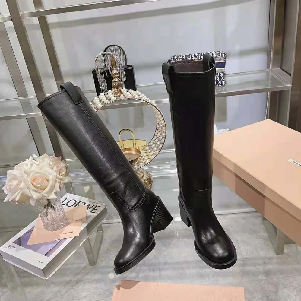 Miu Miu Leather Booties with Screen-printed Logo for Women in Black