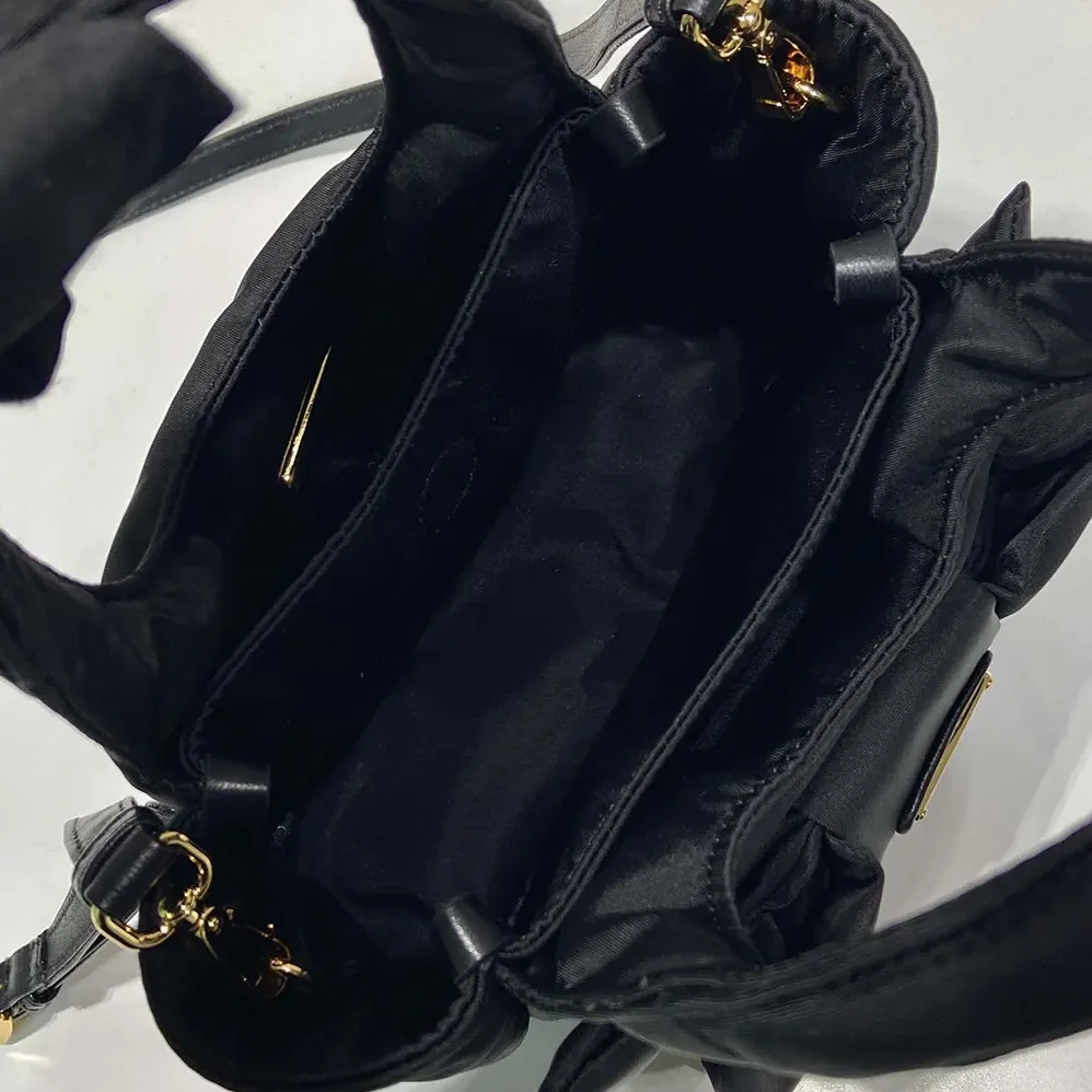 Prada Padded Re-Nylon Mini for Women in bag with Bow