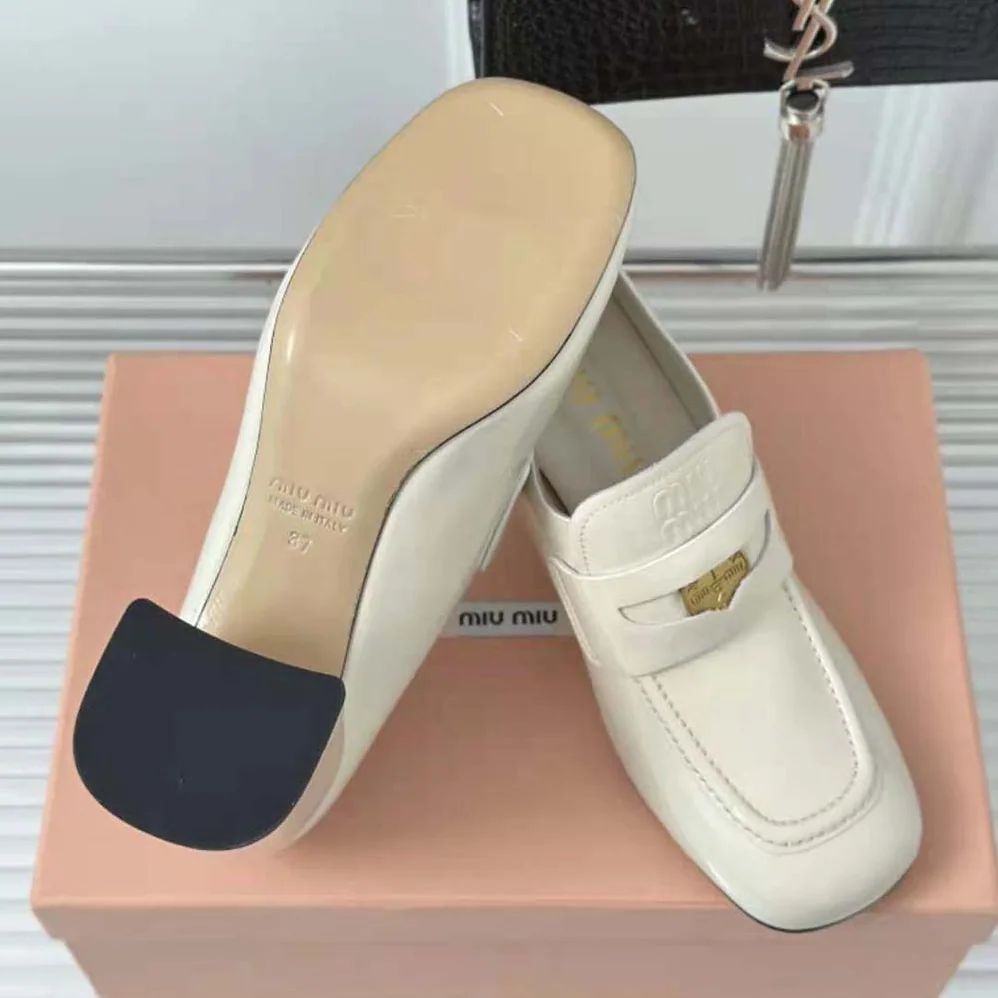 Miu Miu Patent Leather Loafers with Embossed Logo on the Tongue for Women in White Miu Miu Patent Leather Loafers with Embossed Logo on the Tongue for Women in White