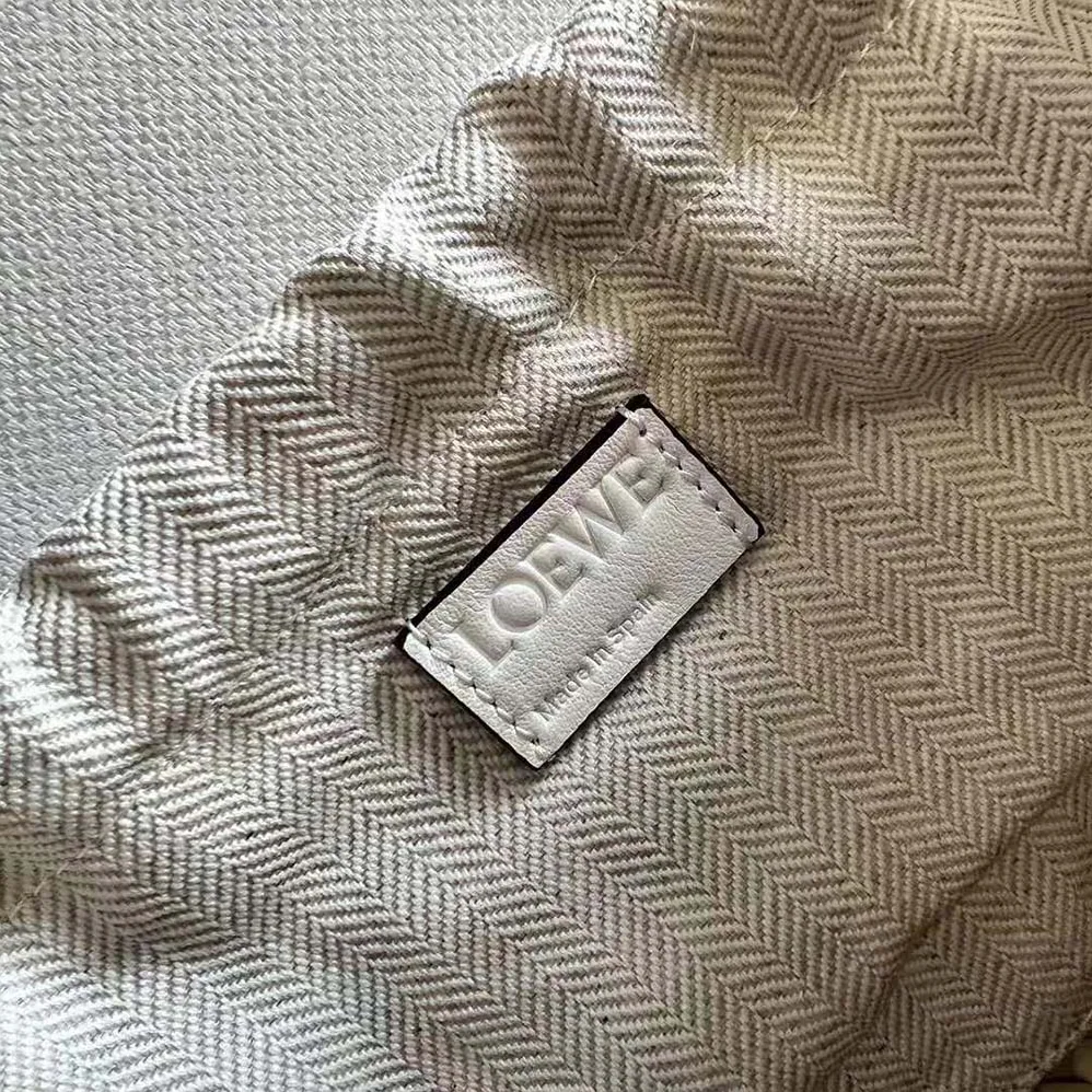 Loewe Drawstring Bucket Bag in Palm Leaf and Calfskin for Women in White Loewe Drawstring Bucket Bag in Palm Leaf and Calfskin for Women in White